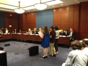 Students in the Moetzet Talmidim (Student Council) give a reading at the National Hunger Seder.