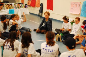 Representatives from the Embassy of Israel speak with sixth grade students.