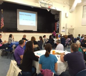 Parents engage in small group discussions following a talk by Dr. Daniel Griffin at the annual Ari Zymelman Lecture Series on Parenting Education.