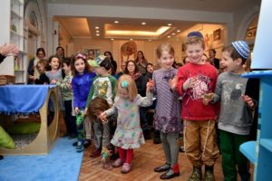 Students celebrate the opening of the new library at the Kindergarten Bayit Patuach (Open House).