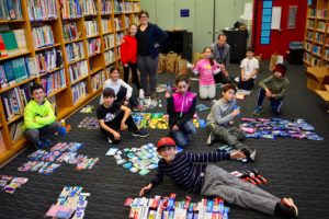 The Moetzet Talmidim (Student Council) sorts the items they collected for U.S. troops.