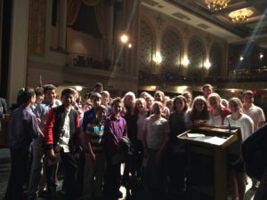 The sixth grade class poses for a photo with Holocaust survivors Rubin Sztajer and Marione Ingram.