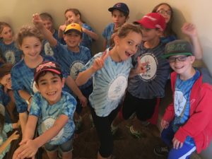 Third graders strike a pose as they arrive at the Shofar Factory.