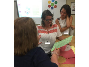 Teachers share insights with each other at JPDS-NC's summer professional development.