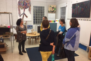 JPDS-NC teachers guide guests through the South Campus.