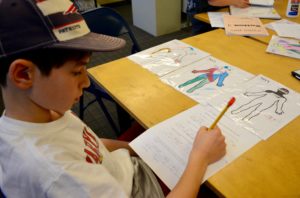 A student composes a poem about his chosen biblical character.