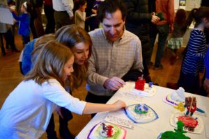 First graders share their learning this semester with their parents at the First Grade Bayit Patuach (Open House).