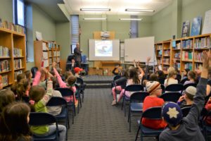 Author Brad Meltzer speaks with third grade students as they learn about the "Biography" genre.