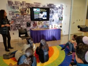 Sixth graders listen to a presentation about early brain development in infants.