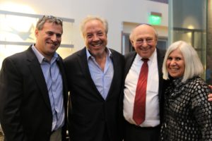 Gil Preuss, Sid Moskowitz, and Dan and Fani Brandenburg pose together at the premiere.